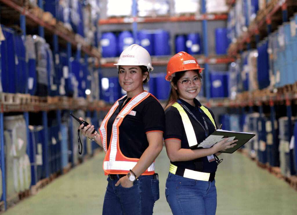 Two Women in Logicore Warehouse
